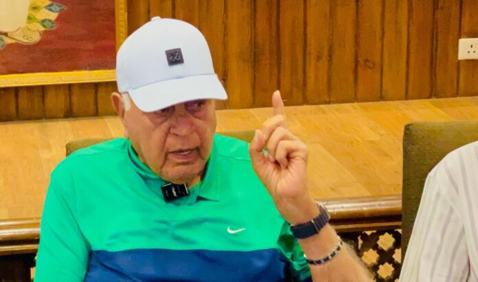 Farooq Abdullah addressing tourism issues in J&K